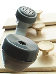 Image showing telephone handset hang over the drawers