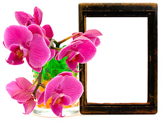 Image showing pink orchid and vooden frame