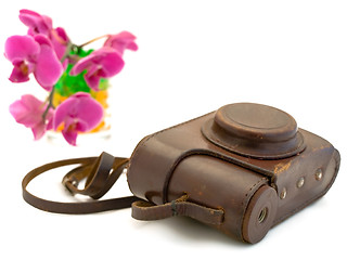 Image showing old photo camera  accessories and pink orchid 