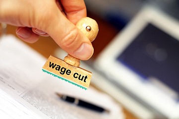 Image showing wage cut
