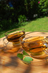 Image showing cup tea in the garden