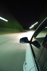 Image showing night drive with car in motion 