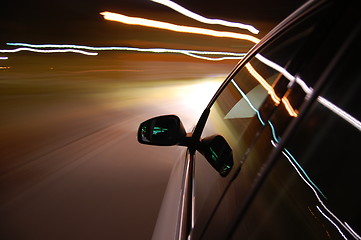 Image showing night drive with car in motion 