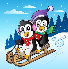 Image showing Winter scene with penguins sledging