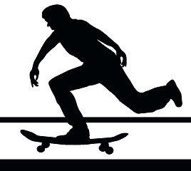 Image showing Skateboarding Building Up Speed