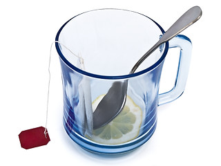 Image showing cup lemon and pack of tea