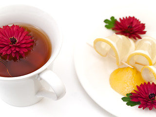 Image showing tea, lemon and flowers