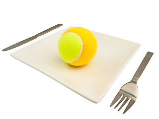 Image showing  knife,  fork and tennis-ball at plate