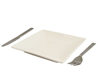 Image showing Plate, knife and fork against white