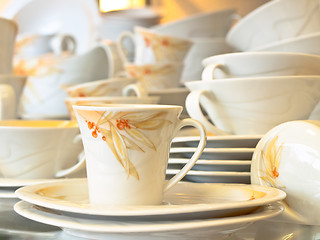 Image showing tea cup and the service