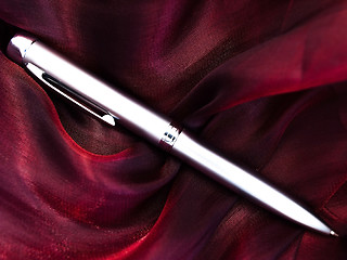 Image showing silver pen at fabric