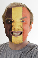 Image showing Face of crazy angry man painted in colors of belgium flag