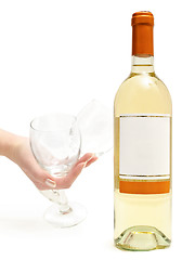 Image showing white wine with wineglass in hand