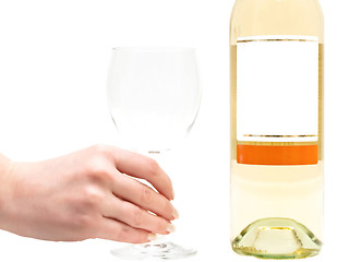 Image showing white wine with wineglass in hand