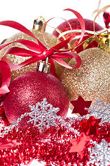 Image showing christmas balls with ribbon and tinsel