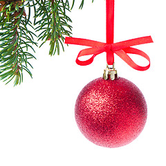 Image showing red christmas ball hanging from tree