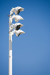 Image showing spotlights against blue sky