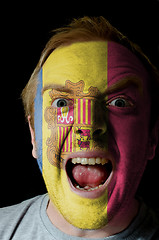 Image showing Face of crazy angry man painted in colors of andora flag