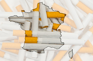 Image showing Map of Finland with cigarettes in background