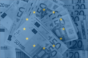 Image showing flag of EU with transparent euro banknotes in background 