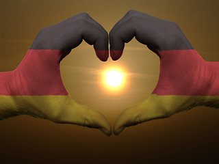 Image showing Heart and love gesture by hands colored in germany flag during b