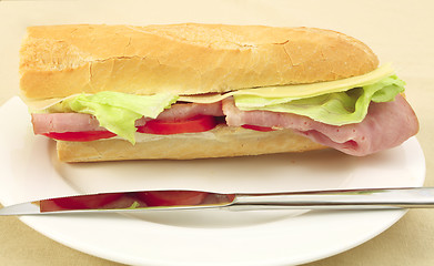 Image showing Ham and cheese baguette side view