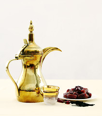 Image showing Arabian coffee and dates