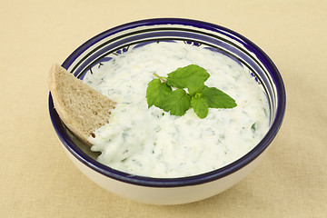 Image showing Tzatziki dip and brown bread