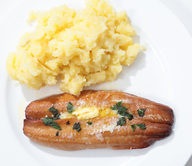 Image showing Grilled kipper and potato from above