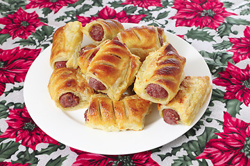 Image showing Sausage rolls with tablecloth