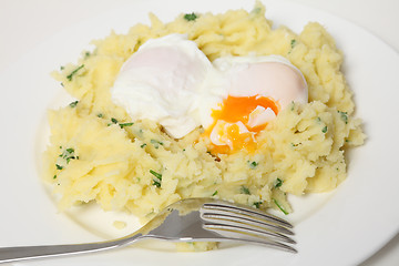 Image showing Poached eggs and potato