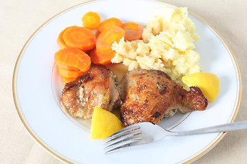 Image showing Lemon chicken meal on plate