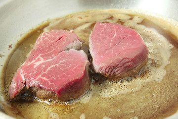 Image showing Cooking filet mignon in frying pan