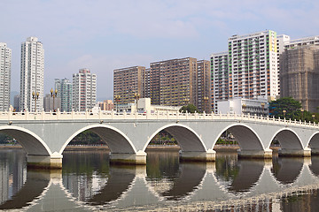 Image showing Arch bridge in asia downtown area, hong kong