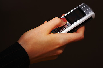 Image showing Mobile phone with hand