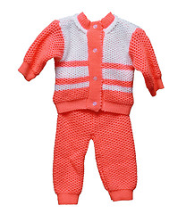 Image showing Knitted wool overalls for baby on white