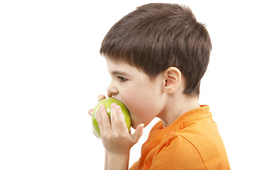 Image showing Boy eat the apple