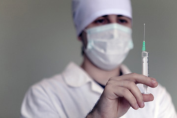 Image showing Doctor with a syringe