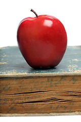 Image showing 	book & red apple