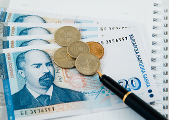 Image showing Money with a pen and some coins