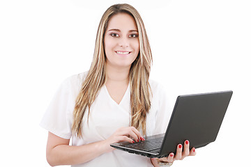 Image showing Beautiful caucasian doctor or nurse holding a laptop computer