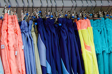 Image showing children's trousers on a hanger in the store