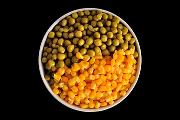 Image showing corn and peas on black