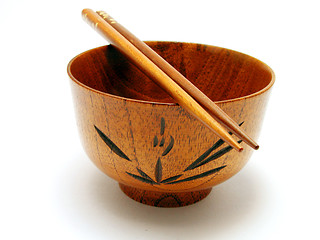 Image showing Wooden bowl and chopsticks