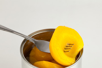 Image showing Peaches in sweet syrup.