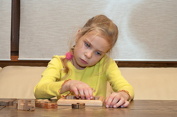 Image showing Girl with conundrum.