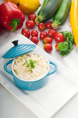 Image showing mac and cheese on a blue little clay pot