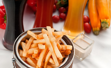 Image showing fresh french fries on a bucket