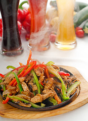 Image showing original fajita sizzling hot  on iron plate