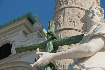 Image showing Statue of an Angel with cross and snake